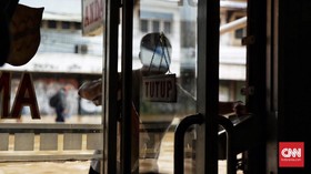 FOTO: Luapan Kali Ciliwung Rendam Jatinegara Barat