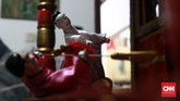 FOTO: Budaya China-Jawa dalam Sekantong Boneka Wayang Potehi Boneka Wayang Potehi yang kerap dipentaskan di kelenteng-kelenteng menjelang Imlek, menyimpan sejarah percampuran budaya China dan Jawa yang kaya.