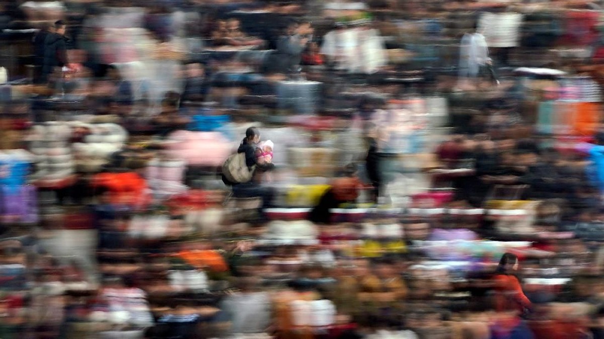 FOTO: Migrasi Manusia Terbesar di Dunia Dimulai Jelang Imlek