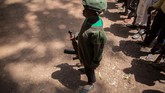 FOTO: Masa Kanak-kanak yang Direnggut Perang Lebih dari 300 tentara anak-anak dibebaskan di Yambio, wilayah yang tercabik perang di Sudan Selatan.