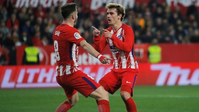 Atletico Madrid menghajar tim tuan rumah Sevilla 5-2 pada laga pekan ke-25 La Liga Spanyol, Minggu (25/2). Antoine Griezmann mencetak hattrick di laga itu.