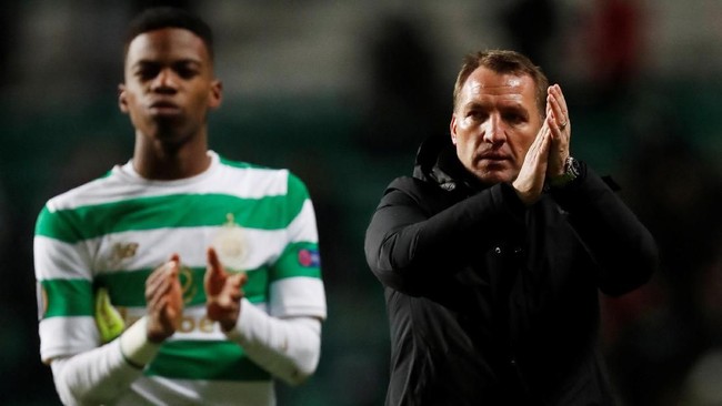 Manajer Celtic Brendan Rodgers mengaku masih menikmati masa keemasannya bersama Celtic dan tak mau ambil pusing dengan spekulasi kepindahan ke Arsenal.