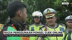 Razia Penggunaan Ponsel Ojek Online