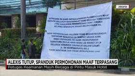 Spanduk Permohonan Maaf Alexis