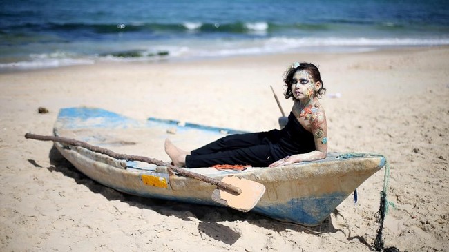 FOTO: Sapuan Rona di Wajah Gaza