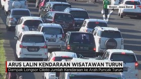 Arus Lalin Kendaraan Wisatawan Turun