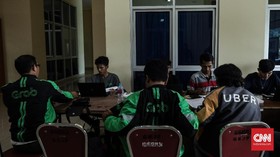 Cegah Tindak Monopoli, KPPU Awasi Aksi Grab