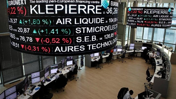 FILE PHOTO: Company stock price information, including Klepierre SA, is displayed on screens as they hang above the Paris stock exchange, operated by Euronext NV, in La Defense business district in Paris, France, December 14, 2016. REUTERS/Benoit Tessier
