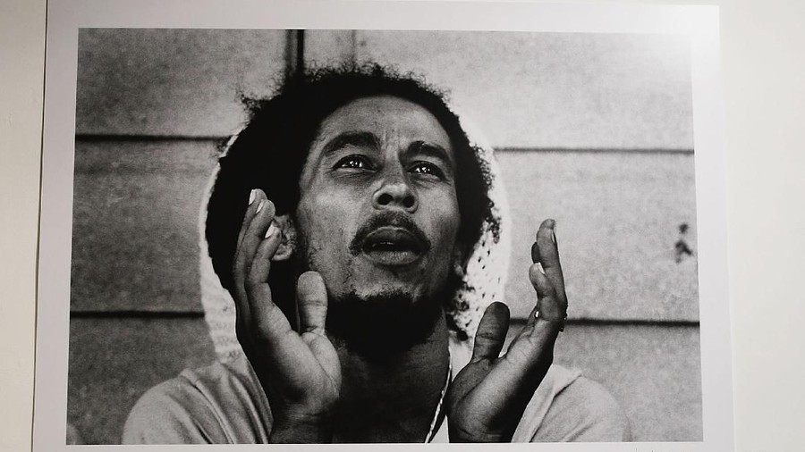 LONDON -  FEBRUARY 3: A portrait of reggae legend Bob Marley at the Private View of the new photographic exhibiton "Tek A Picture A Dis" at the Sony Ericsson Proud Camden on February 3, 2005 in London. The show features unseen photographs of iconic legend Bob Marley to mark what would have been his 60th birthday. Imagery is from three artists who had a close personal relationship with musician: Dan Asher, Kate Simon and Jeff Cathrow. (Photo by Chris Jackson/Getty Images)
