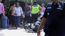 Pria Berjaket Ojek Online Ditangkap Saat Ambil Gambar Polisi