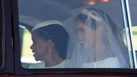 <p>Dalam prosesi di hari pernikahan Meghan, Doria Ragland hadir di Kapel St. George, Windsor, Inggris. Sosoknya penjadi sorotan publik kala itu, Bunda. (Foto: REUTERS/Darren Staples)</p>