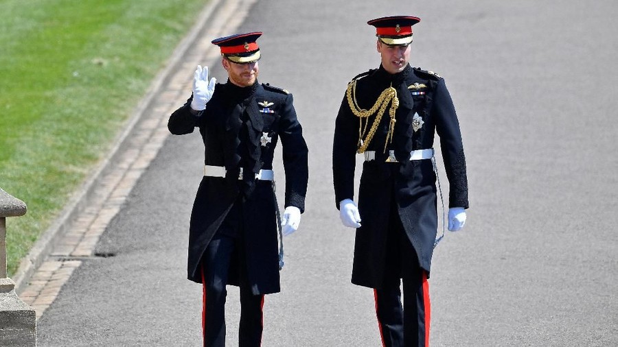 Britain's Prince Harry and Prince William arrive for the wedding ceremony of Prince Harry and Meghan Markle at St George's Chapel in Windsor, Britain, May 19, 2018. REUTERS/Toby Melville/Pool