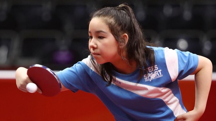 Usianya boleh masih belia, 11 tahun. Tapi bocah ini jago banget main tenis meja lho.
