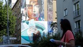 FOTO: 'Berlin Mural Fest 2018' Sulap Ibu Kota Jerman Ajang Berlin Mural Fest 2018 berhasil mempercantik tembok-tembok di ibu kota Jerman dan menarik perhatian para pecinta seni dari seluruh dunia.