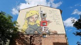 FOTO: 'Berlin Mural Fest 2018' Sulap Ibu Kota Jerman Ajang Berlin Mural Fest 2018 berhasil mempercantik tembok-tembok di ibu kota Jerman dan menarik perhatian para pecinta seni dari seluruh dunia.