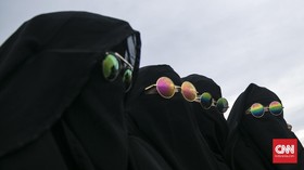 FOTO: Perjuangan Muslimah Bercadar Menghapus Stigma Negatif