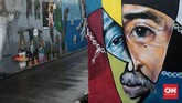 FOTO: Mural Penyemarak Ramadan Karya Warga Jagakarsa Warga Gang Abdul Jabar, Jagakarsa, punya cara sendiri untuk menyemarakkan Ramadan tahun ini. Mereka bergotong-royong membuat mural yang ciamik.