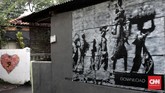 FOTO: Mural Penyemarak Ramadan Karya Warga Jagakarsa Warga Gang Abdul Jabar, Jagakarsa, punya cara sendiri untuk menyemarakkan Ramadan tahun ini. Mereka bergotong-royong membuat mural yang ciamik.