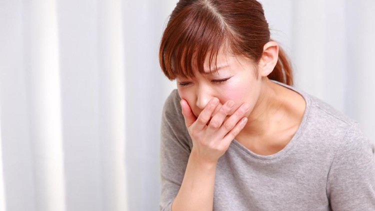 Young vomiting woman portrait. Pregnant blonde suffering with nausea. Pregnancy symptoms, gestosis, parenthood concept