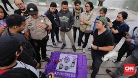 Polisi Aniaya Ketua AJI Palu Saat Razia Kendaraan