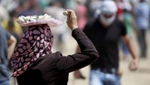 FOTO: Darah dan Air Mata saat Hari Yerusalem Setidaknya tiga orang meninggal dan lebih dari 300 orang luka dalam peringatan Hari Yerusalem atau Hari Alquds, Jumat (8/6) kemarin.