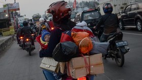 FOTO: Laju Roda Dua di Jalur Mudik