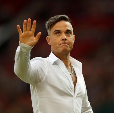 Yakin Terinfeksi Virus Corona, Robbie Williams Ketakutan dan Berlutut