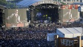 FOTO: 'Surga' Pencinta Musik Menyentak Meski nananya Hellfest, festival musik yang digelar di Prancis setiap tahun bak 'surga' bagi pencinta musik keras menyentak seperti rock, punk dan heavy metal.