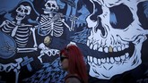 FOTO: 'Surga' Pencinta Musik Menyentak Meski nananya Hellfest, festival musik yang digelar di Prancis setiap tahun bak 'surga' bagi pencinta musik keras menyentak seperti rock, punk dan heavy metal.