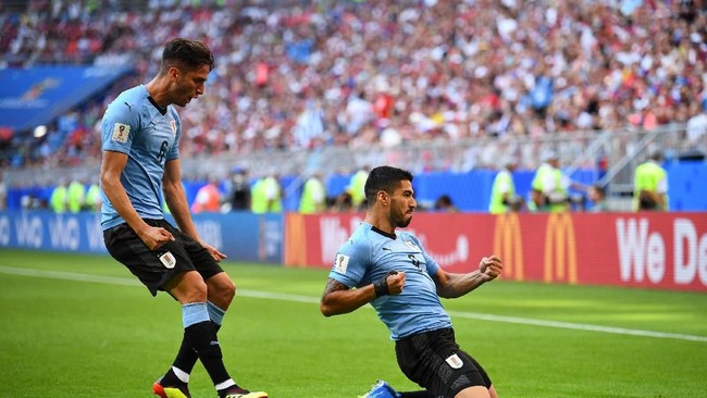 Timnas Uruguay dengan nyaman unggul 2-0 atas tuan rumah Rusia di laga terakhir Grup A Piala Dunia 2018.