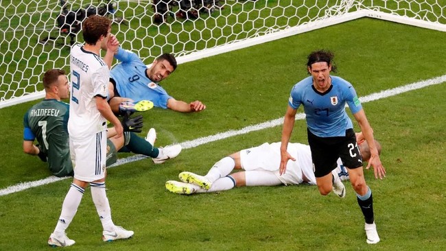 Kalah telak 0-3 dari timnas Uruguay, timnas Rusia baru merasakan lawan berat di laga terakhir Grup A Piala Dunia 2018.