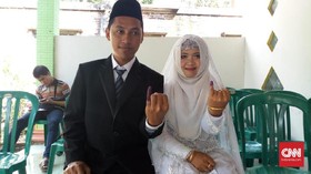 Di Hari Pernikahan, Pengantin Ikut Nyoblos Pilkada