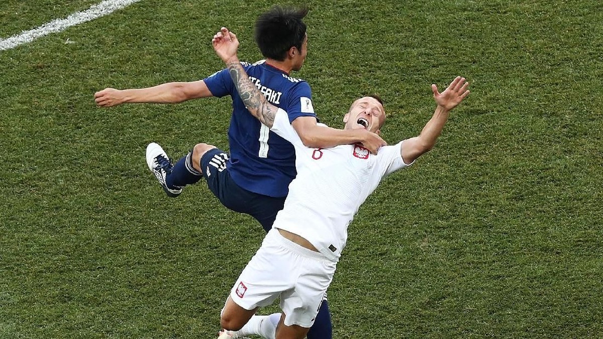 FOTO: Jepang Bisa Tersenyum Meski Kalah dari Polandia