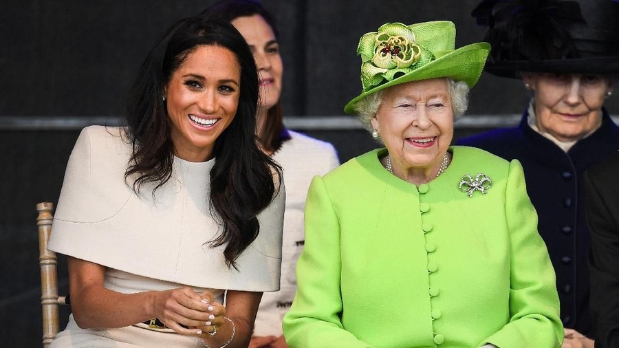 CHESTER, ENGLAND - JUNE 14:  Queen Elizabeth II sits with Meghan, Duchess of Sussex during a ceremony to open the new Mersey Gateway Bridge on June 14, 2018 in the town of Widnes in Halton, Cheshire, England. Meghan Markle married Prince Harry last month to become The Duchess of Sussex and this is her first engagement with the Queen. During the visit the pair will open a road bridge in Widnes and visit The Storyhouse and Town Hall in Chester.  (Photo by Jeff J Mitchell/Getty Images)