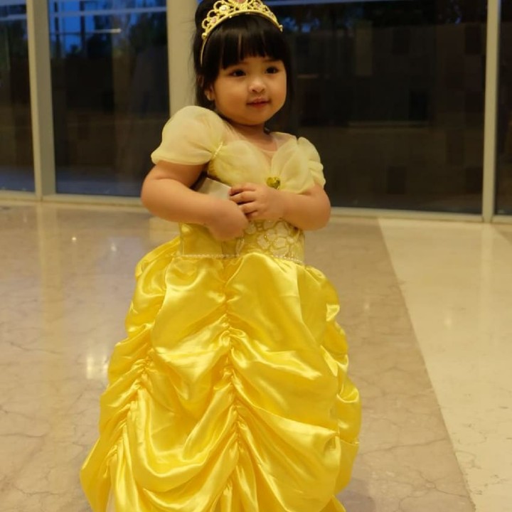 <p>Aquilla makin cute ketika berkostum Princess Belle. Setuju, Bun? (Foto: Instagram/kettykatalya)</p>