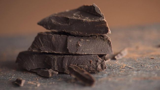 Chocolate chunks on a stone background