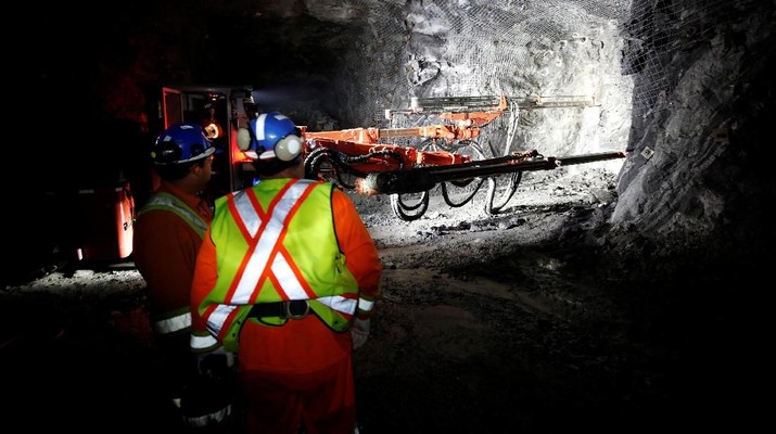 Workers watch an electric jumbo drill at Goldcorp Inc's Borden all-electric underground gold mine near Chapleau, Ontario, Canada, June 13, 2018. REUTERS/Chris Wattie