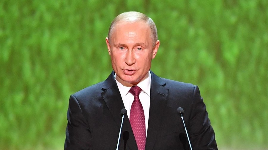 Vladimir Putin Russia's President Vladimir Putin addresses the audience during a gala concert at the Bolshoi Theatre on the eve of the soccer World Cup final match in Moscow, Russia July 14, 2018. Yuri Kadobnov/Pool via REUTERS