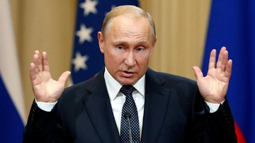 Russian President Vladimir Putin gestures during a joint news conference with U.S. President Donald Trump (not pictured) after their meeting in Helsinki, Finland July 16, 2018. REUTERS/Grigory Dukor