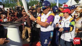 Obor Api Asian Games Disambut Ribuan Orang di Bali