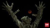 FOTO: Terpukau Pesona Gerhana Bulan Total Gerhana bulan total 'Micro Blood Moon' pada Sabtu dini hari berlangsung 1 jam 43 menit, merupakan yang terlama pada abad ini.