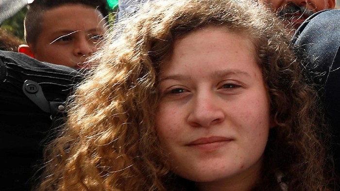 Palestinian teenager Ahed Tamimi and her mother Nareman walk out after they were released from an Israeli prison, at Nabi Saleh village in the occupied West Bank July 29, 2018. REUTERS/Mohamad Torokman