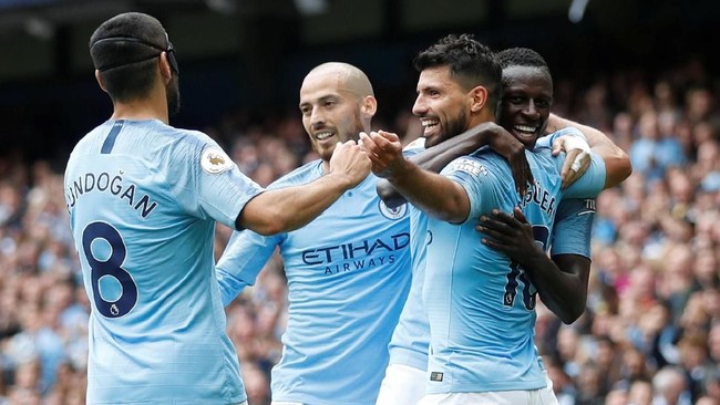 Manchester City menang telak 6-1 atas Huddersfield Town dalam laga kedua di Liga Primer Inggris 2018/2019 di Stadion Etihad, Minggu (19/8).