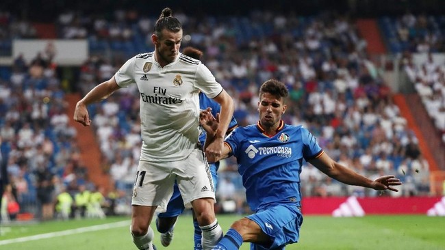 Bek Real Madrid Nacho mengatakan Gareth Bale tak perlu mengikuti jejak Cristiano Ronaldo yang hengkang ke Juventus usai Los Blancos kalahkan Getafe 2-0.