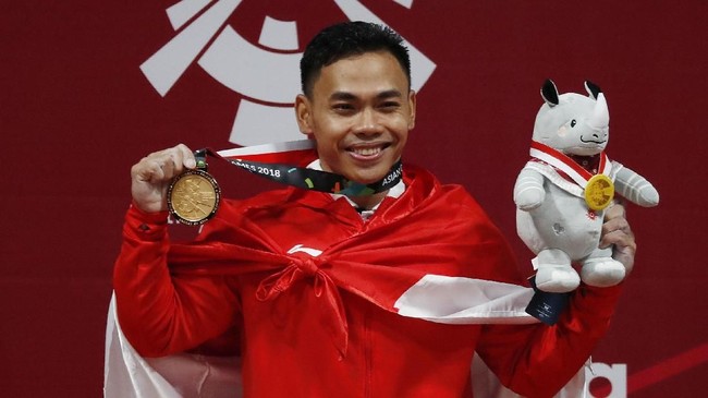 Eko Yuli Irawan mencetak sejarah sebagai lifter pertama Indonesia yang mampu meraih medali emas di ajang Asian Games.