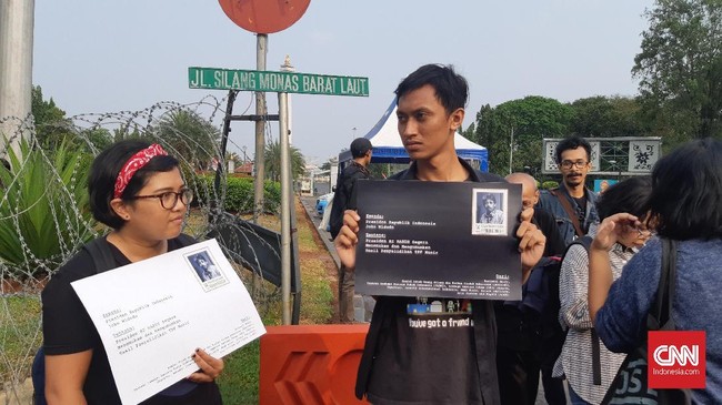 Deputi Koordinator KontraS Feri mengatakan apabila Jokowi taat hukum, maka hasil penyelidikan TPF aktivis Munir segera diungkap ke publik.