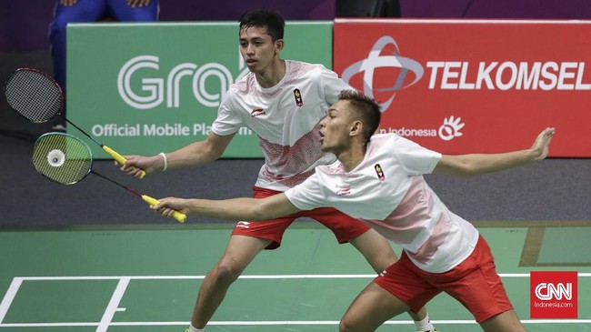 Fajar Alfian/Muhammad Rian Ardianto lolos ke final ganda Putra Asian Games 2018 usai mengalahkan pasangan China Li Junhui/Liu Yuchen di GBK Arena, Senin (27/8).