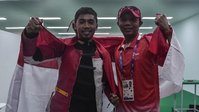 Cabang olahraga menembak menambah perolehan medali Indonesia di Asian Games 2018 dengan meraih perak melalui Muhammad Sejahtera Dwi Putra.