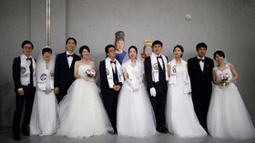 FOTO: 3.000 Pasang 'Oppa-Eonni' Menikah Massal di Korea