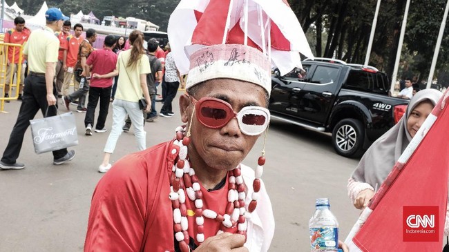 Para pendukung bulutangkis Indonesia pasti tak asing dengan penampilan nyentrik Haryanto di Asian Games 2018.
